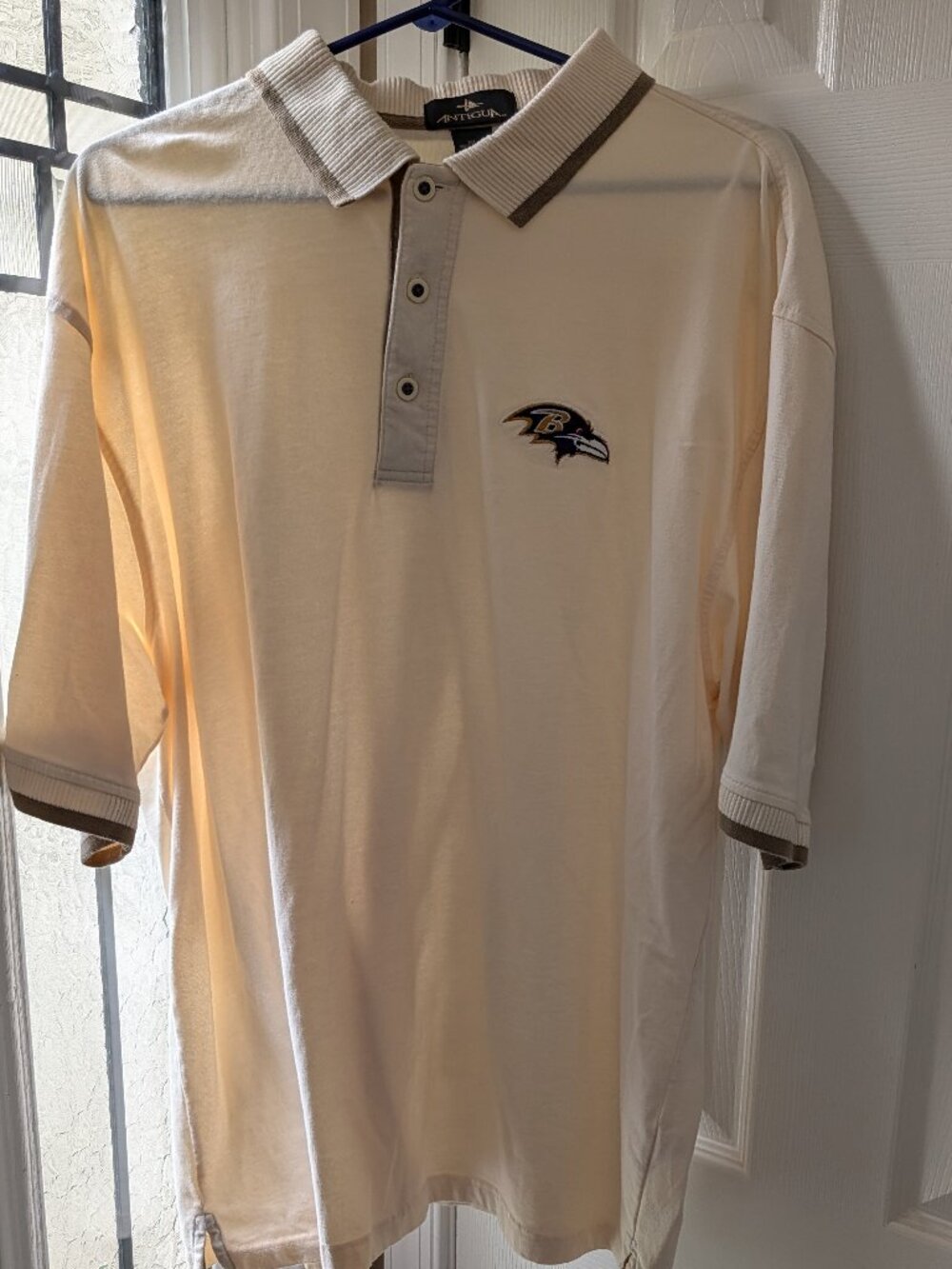 GOLF SHIRT POLO SHOWCASING THE GENUINE NFL LOGO OF BALTIMORE RAVENS -LIKE NEW
